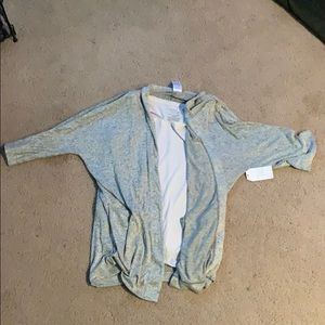 White tank top and grey cardigan together